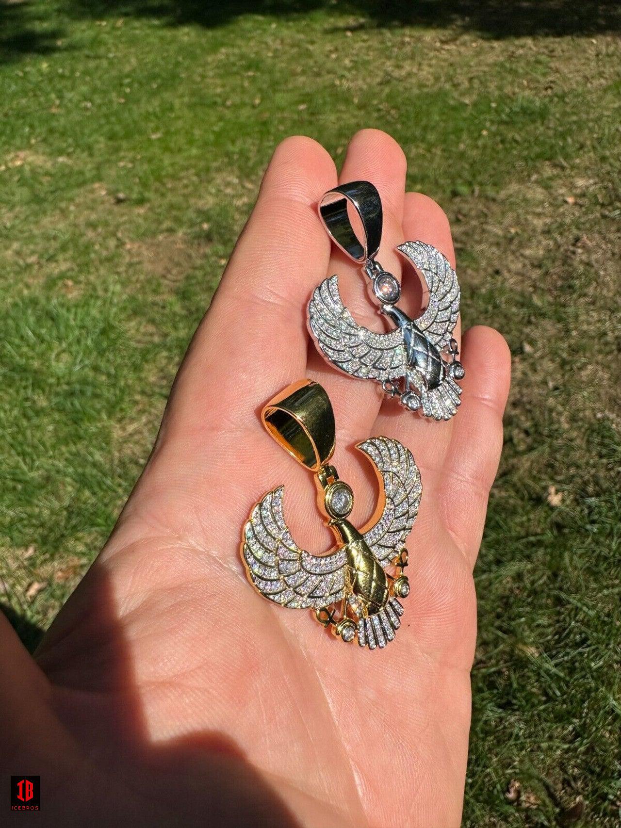 hand Model Showing Egyptian Horus Wing Pendant in 14k White Gold and 14k Gold