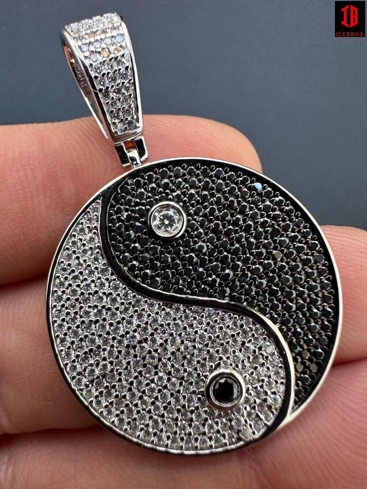 Detailed View Of  14k White Gold Ying Yang Pendant Necklace with White and Black Moissanite Stones