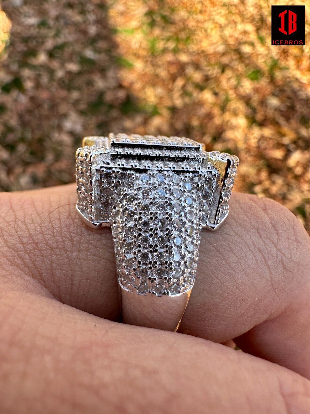 A Detailed Sideview Of 14k White Gold Iced Out Moissanite Ring