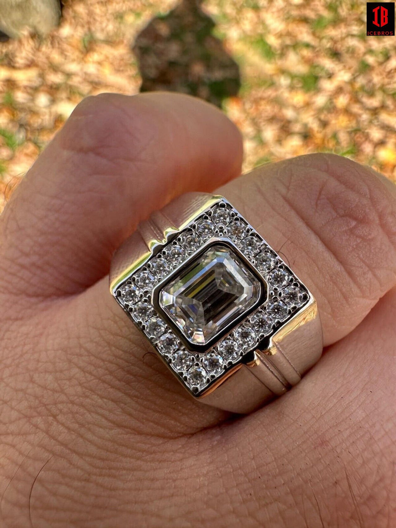 A Detailed View of  Men wearing beautiful Shinning White Gold Emerald-cut Moissanite Ring  on His hand