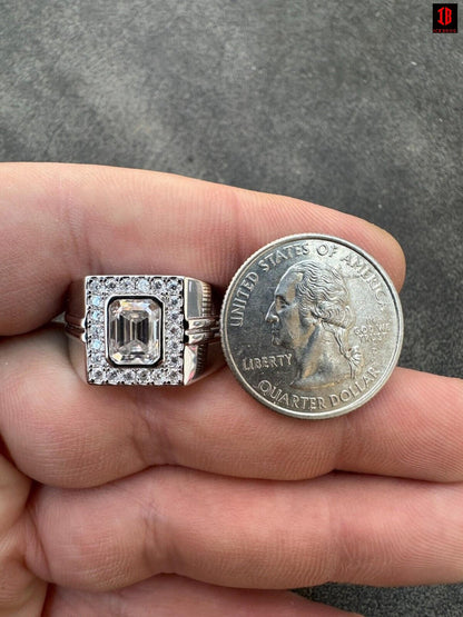 A White Gold Plated over 925 Sterling Silver Ring Compared to Silver Coin  in Hand Showing the  Shinning and Luxuries Shine Of White Gold and  Moissanite Diamonds