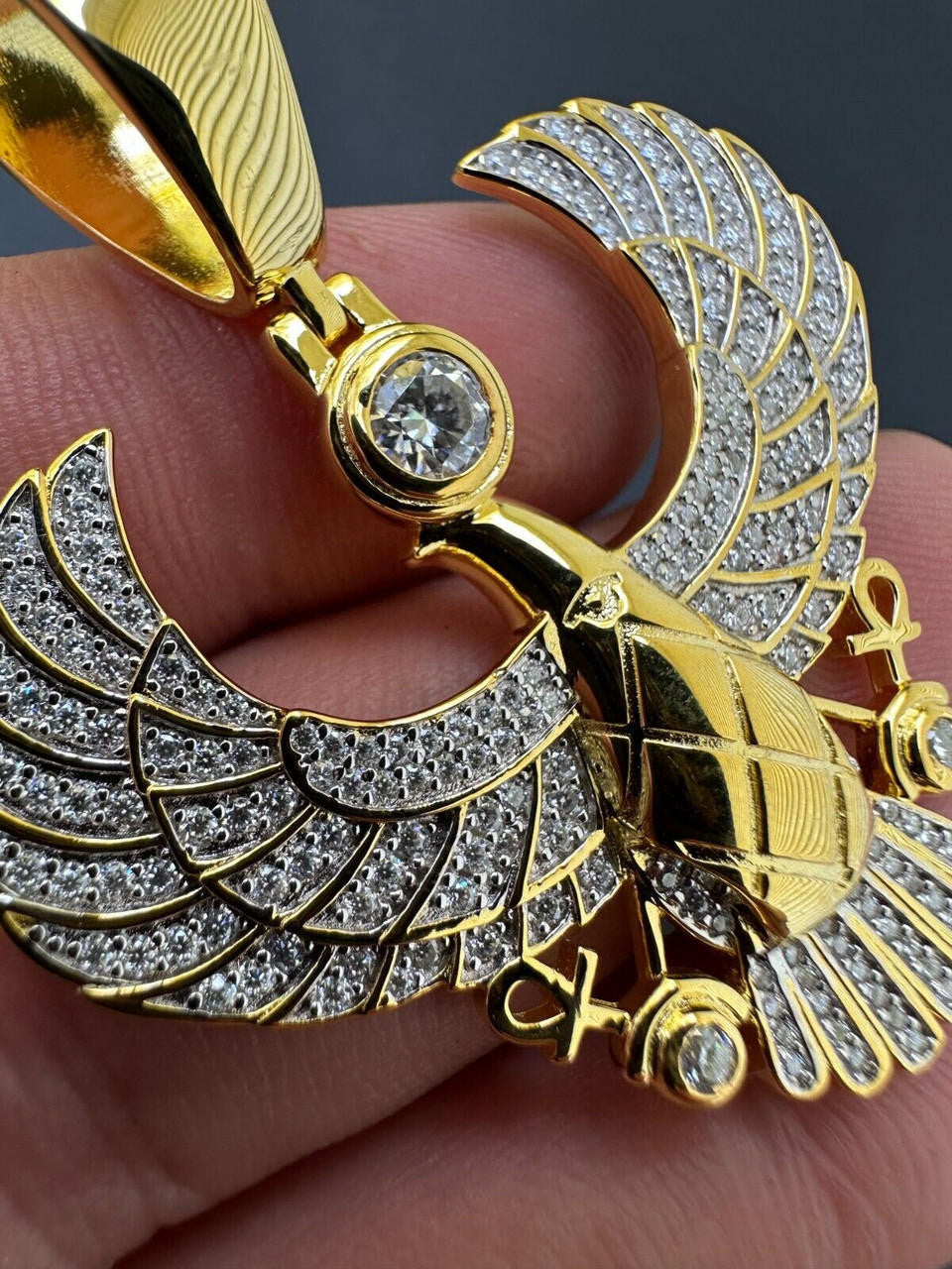 A Detailed view Of 14k Yellow Gold Horus Falcon Wing Pendant Necklace Plated on 925 Sterling Silver