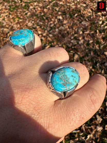 A man wearing a two stunning blue turquoise Oval Cut Gemstones Ring on Hand